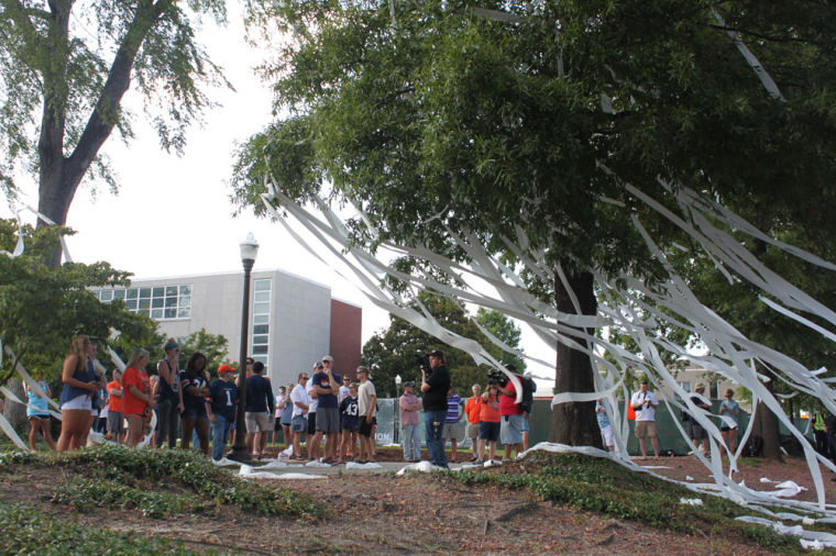 AU fans gather at Toomer's Corner in memory of Philip Lutzenkirc
